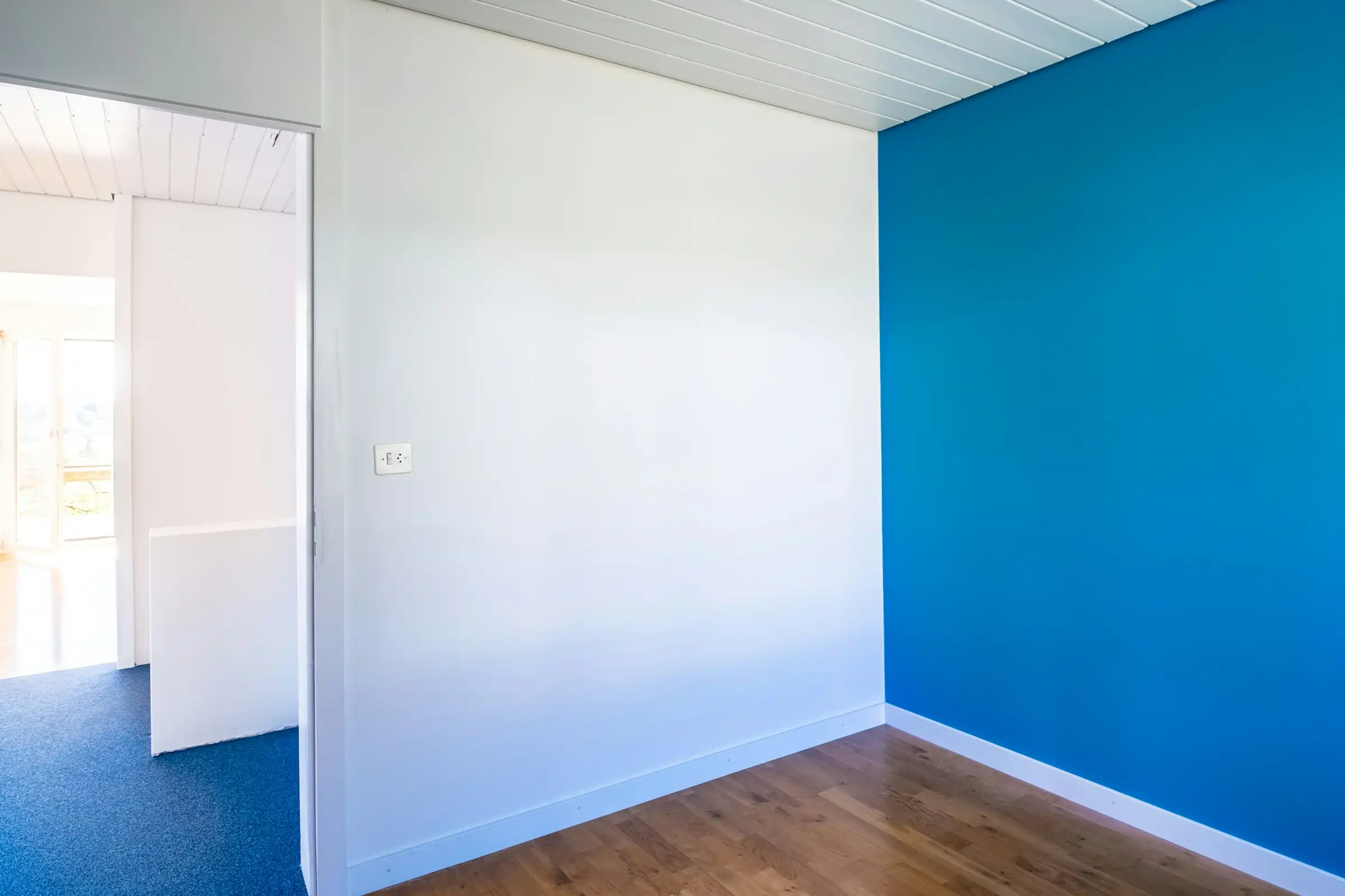 Interior painting project with crisp trim and wall finish